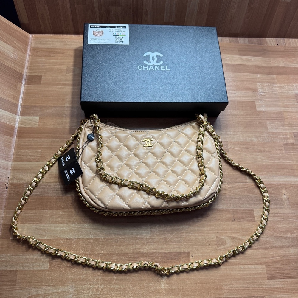 Tan quilted purse with chain new in box